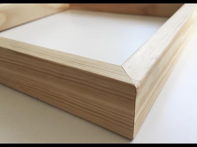 montaggio su telaio in legno